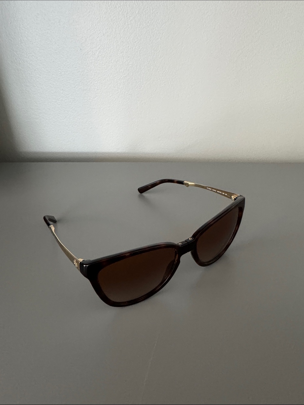 Tory Burch Foldable Tortoise Acetate Sunglasses with Gold Temples Brown Lenses